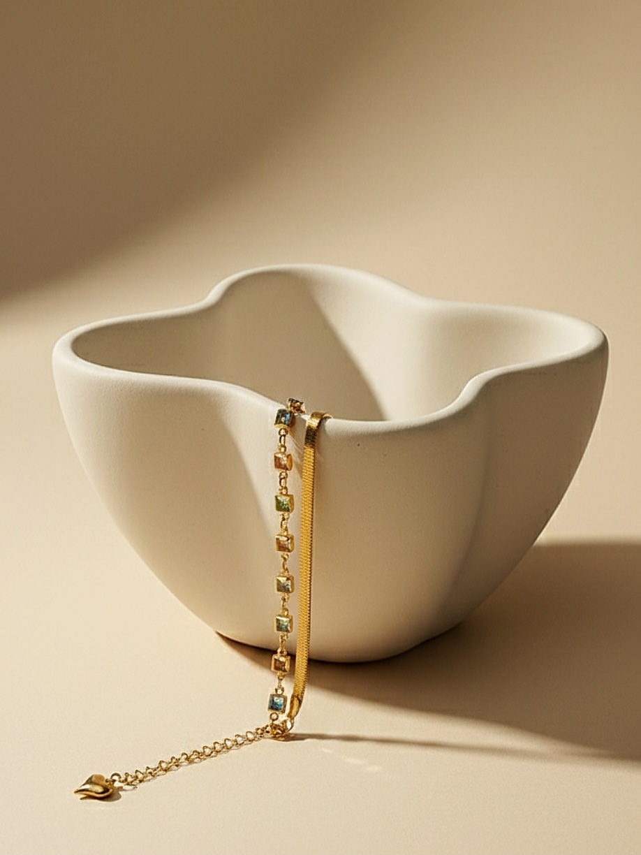 دستبند ترکیب زنجیر ماری تخت و نگین‌دار رنگی